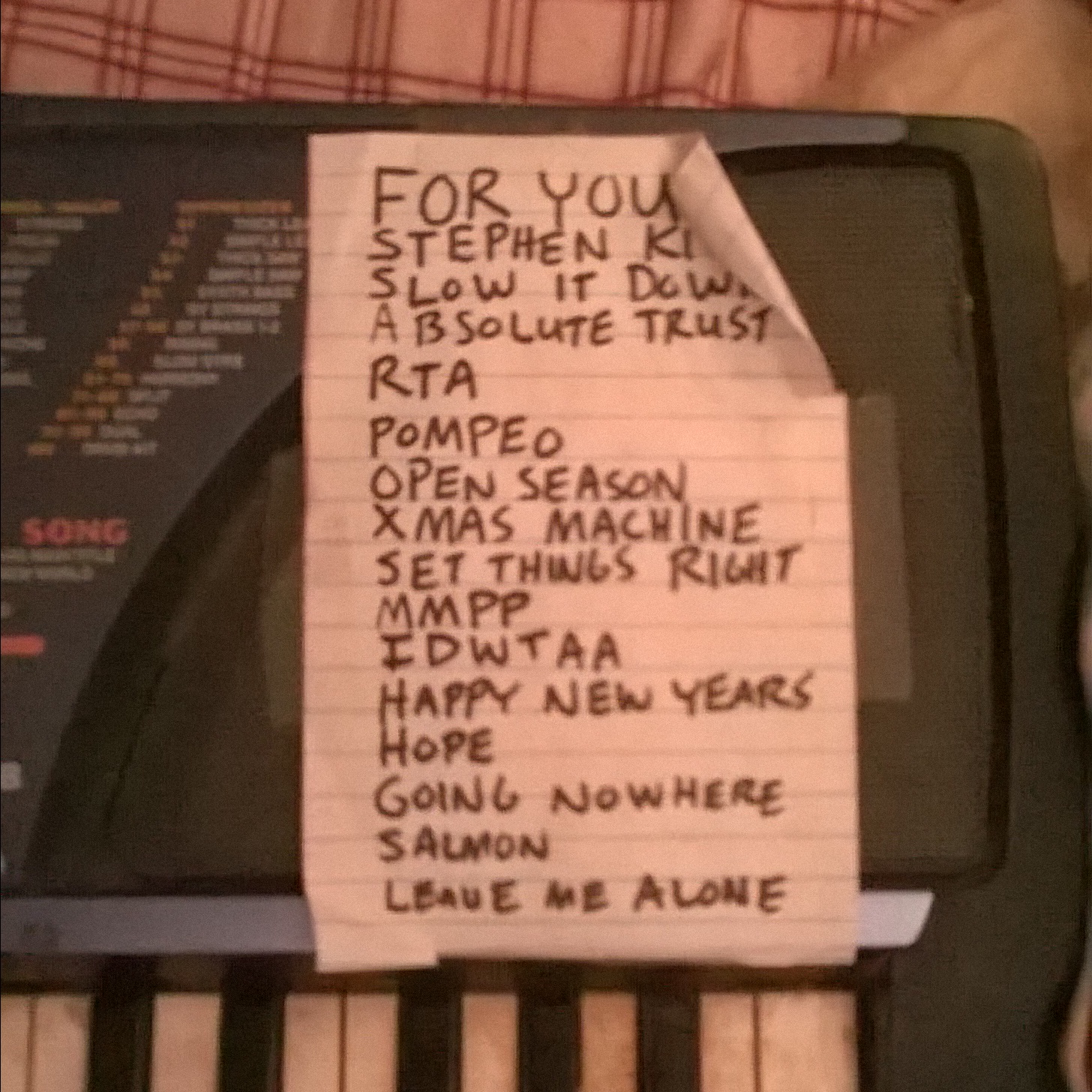 Handwritten set list from a live show